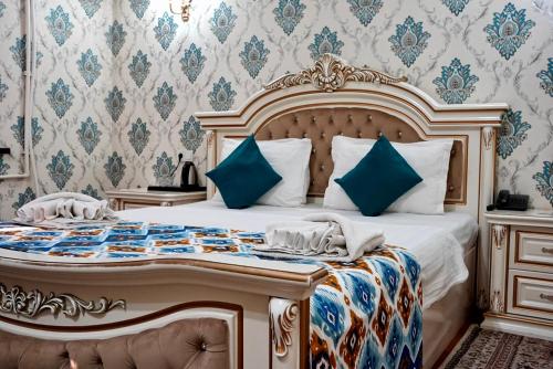 Postel nebo postele na pokoji v ubytování Profi Boutique hotel