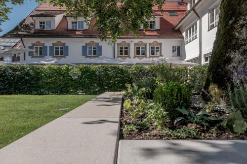 a walkway in front of a house at Alpenhotel Krone in Pfronten