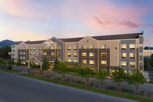 an rendering of a hotel at dusk at TownePlace Suites by Marriott Anchorage Midtown in Anchorage