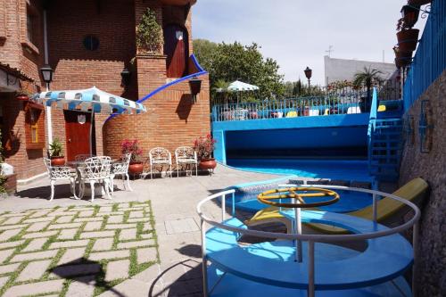 einen Pool mit Pool in der Unterkunft Suites Poza Real in Tequisquiapan