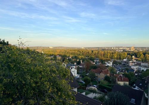 a view of a city with trees and buildings at Studio aux portes d'Orly & Paris in Athis-Mons