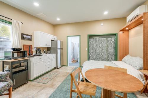 a kitchen and dining room with a table in a room at Less Than half Mi to OSU Studio in Corvallis Near Parks in Corvallis