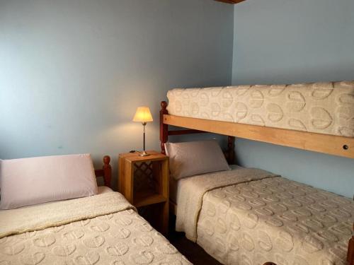 Cama o camas de una habitación en Cabana Mirador Sumajpacha