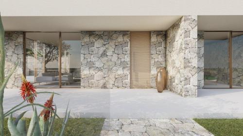 Una representación de una casa con un muro de piedra. en Vog Villa, en Tirane