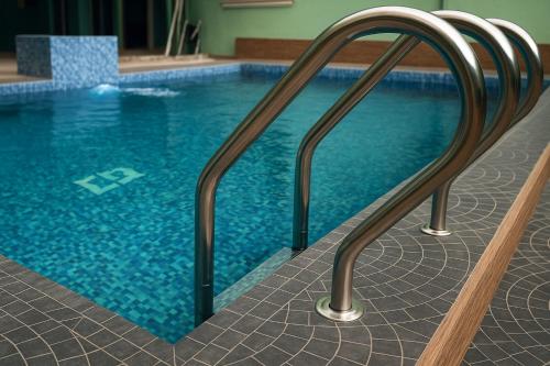 Πισίνα στο ή κοντά στο Okiroro Green Field Hotel