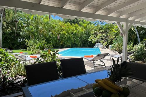 Piscina a Villa Secrète o a prop
