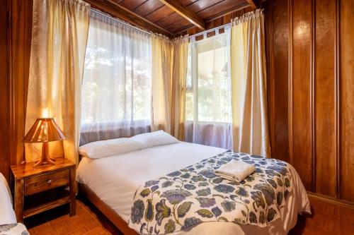 Ένα ή περισσότερα κρεβάτια σε δωμάτιο στο Hotel Holístico Monteverde