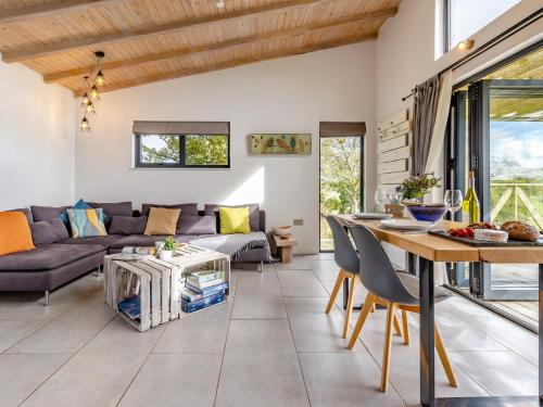 a living room with a couch and a table at 1 Bed in Llandrindod Wells 53194 in Llandrindod Wells