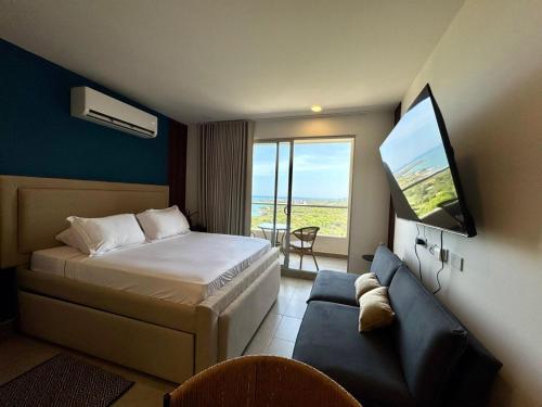 Postel nebo postele na pokoji v ubytování Santa Marta apartamento frente al mar -Santamarina- 1802