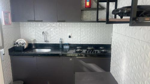 Kuchyň nebo kuchyňský kout v ubytování vista mar e por do sol- morro de sao paulo