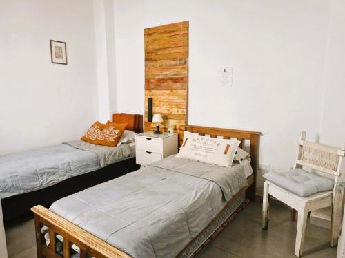 Postel nebo postele na pokoji v ubytování Acogedora habitación para mujeres viajeras