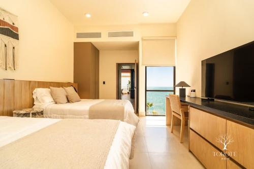 Postel nebo postele na pokoji v ubytování Penthouse Punta Península Bahía de Kino