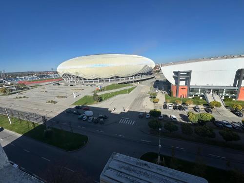 an aerial view of a large building with a large stadium at Apartament Central Ilie Balaci 15 in Craiova