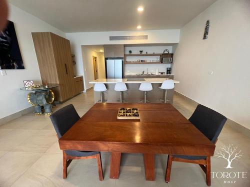 Kuchyň nebo kuchyňský kout v ubytování Condominio Frente al Mar