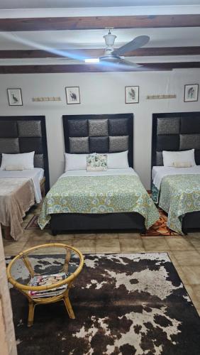 Postel nebo postele na pokoji v ubytování MP Stop Guest House