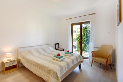 Apartments with parking space Umag - 22622