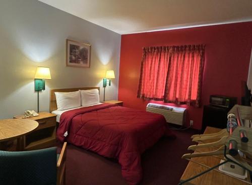 Postel nebo postele na pokoji v ubytování Astoria inn