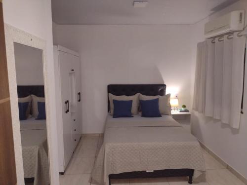 Postel nebo postele na pokoji v ubytování Residência dos Valentes