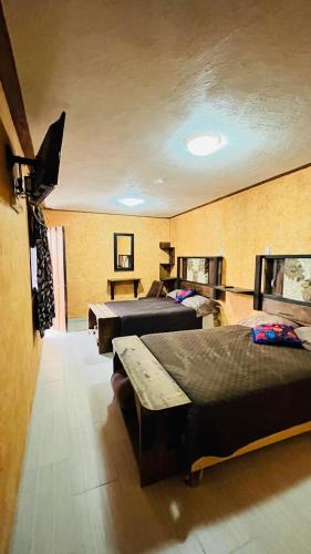 Postel nebo postele na pokoji v ubytování Pasada feregrino