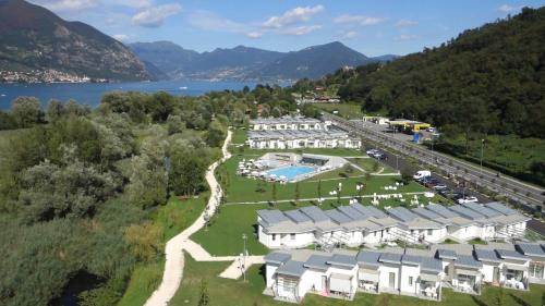 an aerial view of a resort near a lake at Costa Verde Natura in Clusane sul Lago