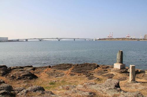 a view of a bridge over a body of water at Chihaya Relaxation Haven in Fukuoka