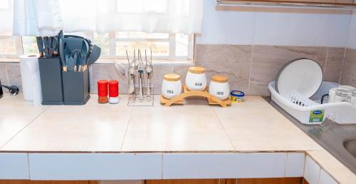 Køkken eller tekøkken på Pearl Furnished Apartment