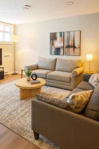 a living room with a couch and a table at Modern 2BR Westville Downtown Near Yale Wifi in New Haven