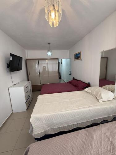 Postel nebo postele na pokoji v ubytování 1 Quarto até 4 Hospedes