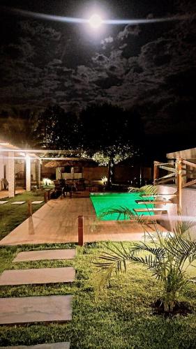a skate park at night with a green skate park at Pousada Jalapão Sunset in Mateiros