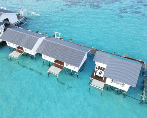 an aerial view of a resort on the water at Bubblefish Water Villa in Kampong Bum Bum