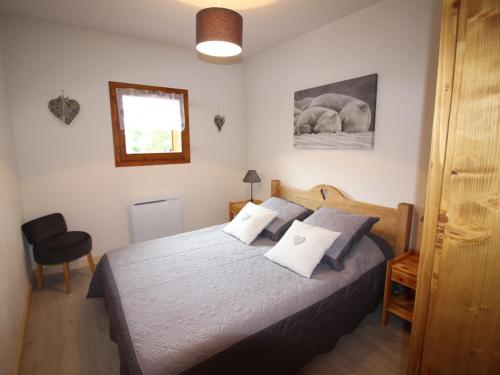 Ένα ή περισσότερα κρεβάτια σε δωμάτιο στο Appartement 2 chambres, pied de piste, parking, 6 personnes - FR-1-836-18