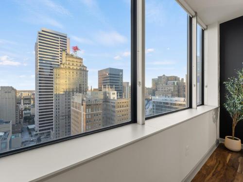 a window with a view of the city at 17th Floor Downtown Dallas Skyline City View High Rise in Dallas
