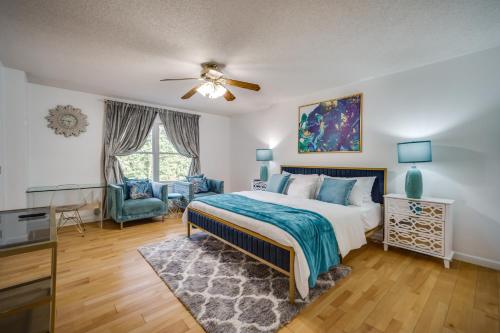 a bedroom with a bed and a living room at King Bed with Pool Table in Chicopee