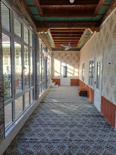 Ένα ή περισσότερα κρεβάτια σε δωμάτιο στο Guest House Faiz