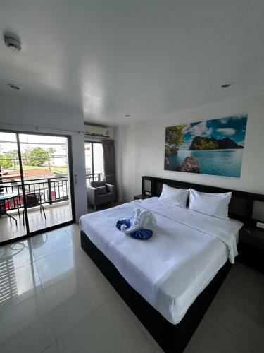 Postel nebo postele na pokoji v ubytování KANPAI HOTEL