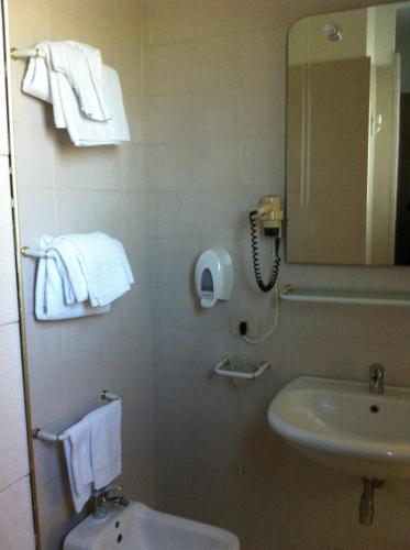 Koupelna v ubytování Hotel Atleti