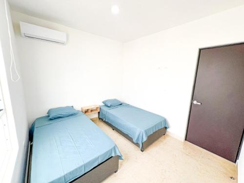 Una cama o camas en una habitación de New luxury apartament in Playa del Carmen