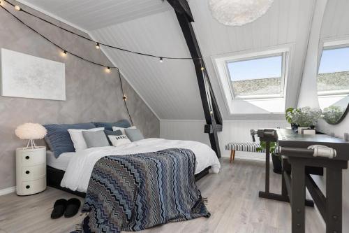 Ένα ή περισσότερα κρεβάτια σε δωμάτιο στο Porsgrunn city center - modern apartment with garage