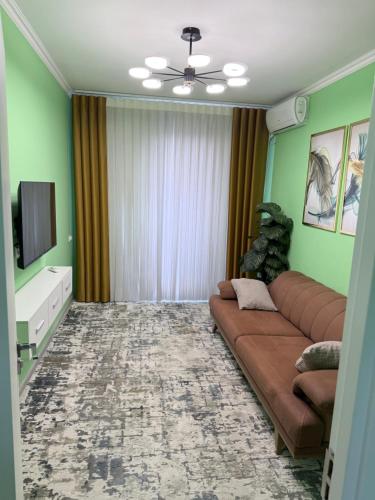 TV a/nebo společenská místnost v ubytování Assalom sohil