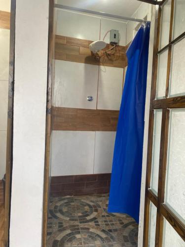 Μία ή περισσότερες κουκέτες σε δωμάτιο στο Casa de la abuela