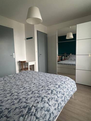 Postel nebo postele na pokoji v ubytování L'escapade Clisson