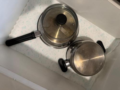 a pot sitting on top of a counter at Maple Grove Yasuragi Stay in General Trias