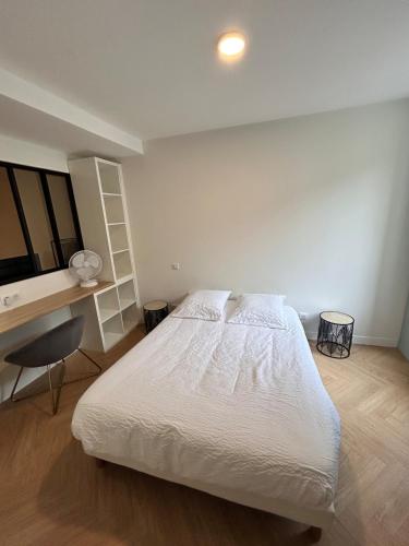 Postel nebo postele na pokoji v ubytování Le scandinave