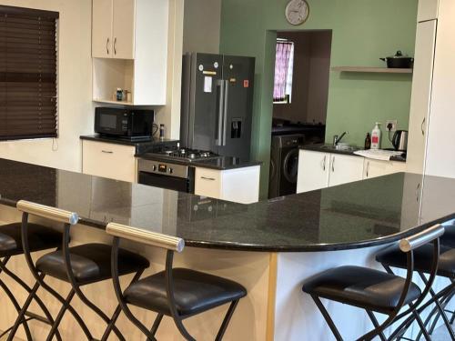 Kuchyň nebo kuchyňský kout v ubytování Peshi's Guest House