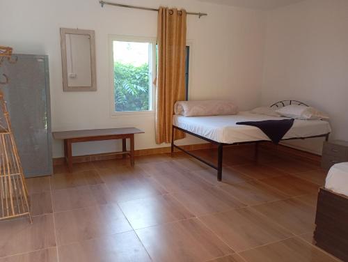 Postel nebo postele na pokoji v ubytování Chital lodge