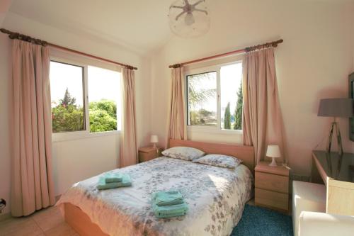 Llit o llits en una habitació de Helene Villa