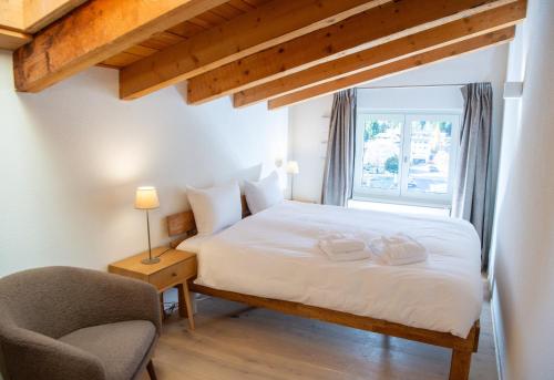 Ένα ή περισσότερα κρεβάτια σε δωμάτιο στο 4 room apartment for 8 people Bergcafé Aurora Lenzerheide