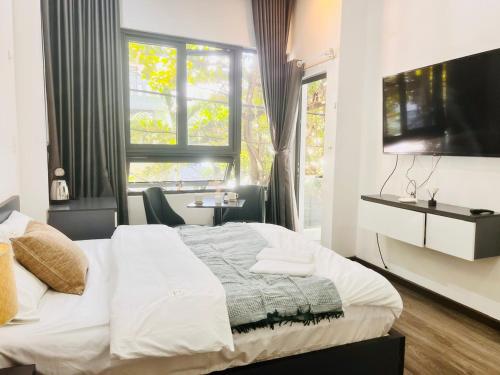 Een bed of bedden in een kamer bij Levi Living