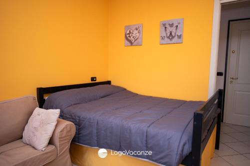 Ένα ή περισσότερα κρεβάτια σε δωμάτιο στο Suite Panorama Puegnago