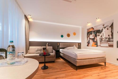 Ένα ή περισσότερα κρεβάτια σε δωμάτιο στο Stay by Triller - Aparthotel